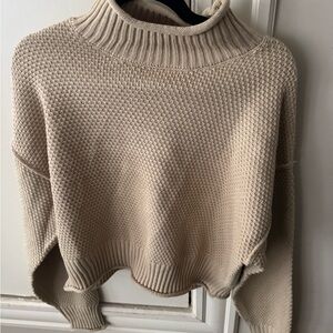 Cozy Cream Turtleneck Sweater outfit with skirt in a size small